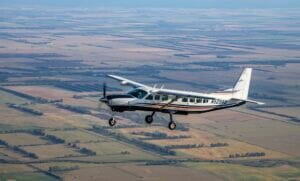 95West aerial photo of Cesna aircraft over rural landscape